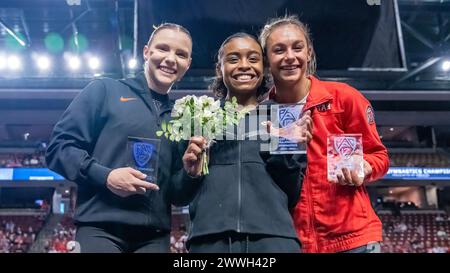 West Valley City, USA. März 2024. Jade Carey (links) und Grace McCallum (rechts als Zweiter im All Around, und Selena Harris (Mitte) der UCLA gewann es bei der Pac-12 Women's Gymnastics Championship im Maverik Center, West Valley City, Utah am 23. März 2024 (Foto: Jeff Wong/SIPA USA) Credit: SIPA USA/Alamy Live News Stockfoto