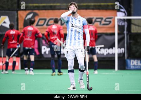 Brasschaat, Belgien. März 2024. Gantoise's Antoine Kina scheint während eines Hockeyspiels zwischen KHC Dragons und Gantoise am Sonntag, den 24. März 2024 in Brasschaat, am 18. Tag des ION Hockey League Wettbewerbs der belgischen Elitedivision, niedergeschlagen zu sein. BELGA FOTO TOM GOYVAERTS Credit: Belga Nachrichtenagentur/Alamy Live News Stockfoto