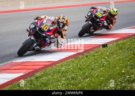 Portimao, Portugal. März 2024. Luca Marini aus Italien und Repsol Honda Team (10) und Joan mir aus Spanien und Repsol Honda Team (36) im Einsatz während des MotoGP-Rennens des Tissot Grand Prix von Portugal am 24. März 2024 auf dem Algarve International Circuit in Portimao, Portugal. Quelle: SOPA Images Limited/Alamy Live News Stockfoto