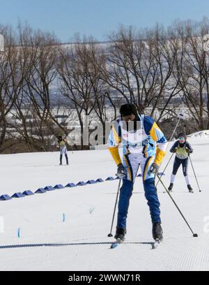 Dalijha Hill, vom Virgin Islands National Guard Team, beendet das Sprint Race beim 50-jährigen Jubiläum Chef der National Guard Bureau Biathlon Championships im Soldier Hollow Nordic Center, 17. Februar 2024. Die Utah National Guard veranstaltete den nationalen Biathlonwettbewerb, der aus Skilanglauf und Wettkampfschießen bestand, bei dem die Ausdauer und das Geschick der Krieger getestet wurden. Stockfoto