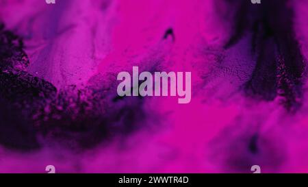 Tintentropfen Neon Hintergrund rosa schwarze Farbe Tropf Stockfoto