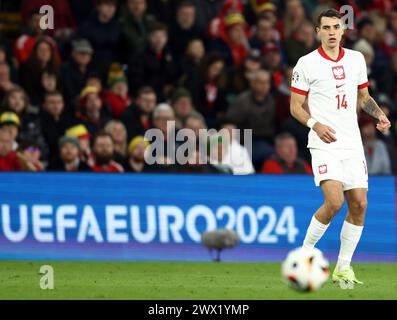 Cardiff, Großbritannien. März 2024. Jakub Kiwior aus Polen während des Qualifikationsspiels zur UEFA-Europameisterschaft im Cardiff City Stadium. Der Bildnachweis sollte lauten: Darren Staples/Sportimage Credit: Sportimage Ltd/Alamy Live News Stockfoto