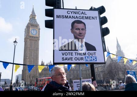 Am Tag, an dem der konservative Finanzminister Jeremy Hunt seine Rede zum Haushalt vor den Wahlen hält, versammeln sich Demonstranten in Westminster, um gegen die von Tory betriebene Wirtschaft am 6. März 2024 in London, Großbritannien, zu protestieren. Stockfoto