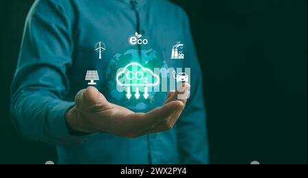 Reduzieren Sie CO2-Emissionen und CO2-Fußabdruck, um die globale Erwärmung und den Klimawandel zu begrenzen. Nachhaltige Entwicklung und umweltfreundliches Unternehmen auf Basis erneuerbarer Energien Stockfoto