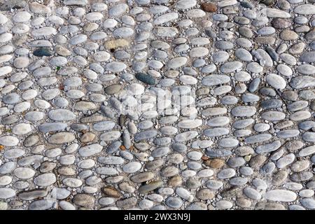 Steinpflasterhintergrund aus der Altstadt von Rhodos in griechenland Stockfoto