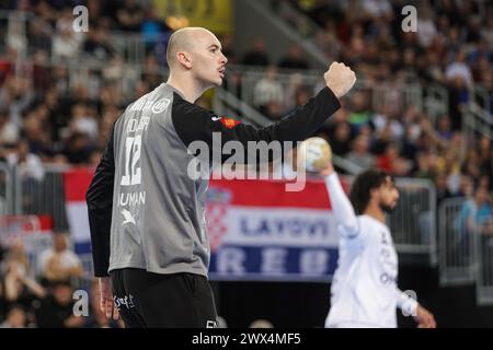 Zagreb, Kroatien. März 2024. ZAGREB, KROATIEN - 27. MÄRZ: Torhüter von Montpellier HB Charles Bolzinger reagiert auf das Play-off-Spiel der EHF Champions League Men 2023/24 zwischen dem HC Zagreb und Montpellier HB in der Arena Zagreb am 27. März 2024 in Zagreb. Foto: Luka Stanzl/PIXSELL Credit: Pixsell/Alamy Live News Stockfoto