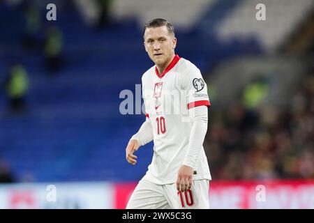 Cardiff, Großbritannien. März 2024. Piotr Zielinski aus Polen wurde während des Qualifikationsspiels zur UEFA-Europameisterschaft (Play-off) zwischen Wales und Polen im Cardiff City Stadium gesehen. Endstand; Wales 0:0 Polen (Elfmeter; 4:5). Quelle: SOPA Images Limited/Alamy Live News Stockfoto