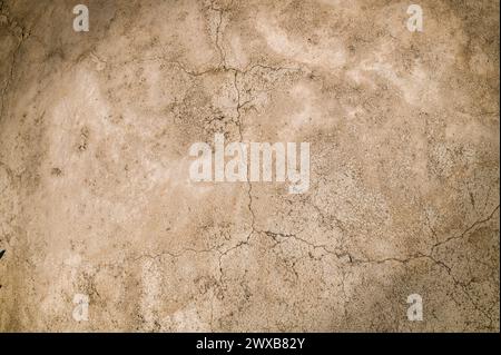 Alte verputzte Wand mit Rissen als Hintergrund 1 Stockfoto