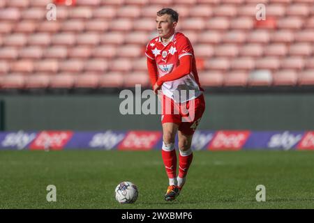 Barnsley, Großbritannien. März 2024. Jamie McCart von Barnsley bricht mit dem Ball während des Sky Bet League 1 Spiels Barnsley gegen Cambridge United in Oakwell, Barnsley, Großbritannien, 29. März 2024 (Foto: Alfie Cosgrove/News Images) in Barnsley, Großbritannien am 29. März 2024. (Foto: Alfie Cosgrove/News Images/SIPA USA) Credit: SIPA USA/Alamy Live News Stockfoto