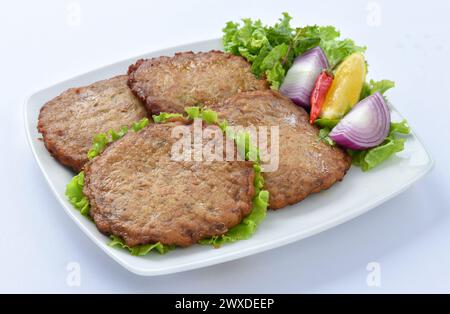 Chapli Kabab, Ein köstliches Essen, gehört zu Pakistans Region KPK. Es ist sehr lecker, zubereitet von Rindfleisch oder Hühnchen Meet. Stockfoto