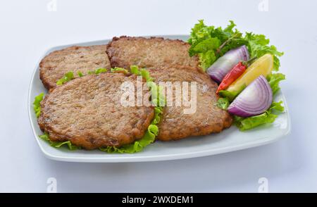 Chapli Kabab, Ein köstliches Essen, gehört zu Pakistans Region KPK. Es ist sehr lecker, zubereitet von Rindfleisch oder Hühnchen Meet. Stockfoto