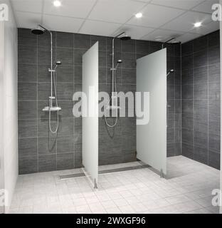 Drei neue leere Duschen. Stockfoto