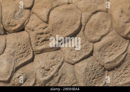 Beige Farbe Sand Rough Solid Stone Wall Textur Abstraktes Muster Hintergrund. Stockfoto