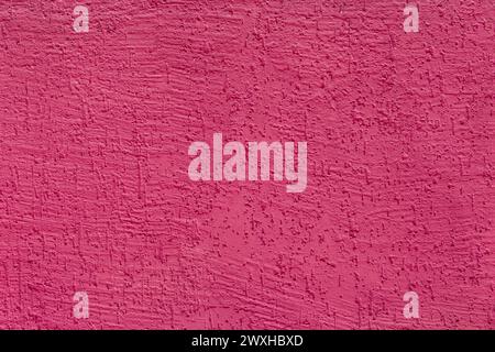 Rosa Farbe Beton Wand Oberfläche Putz Textur Stuck Hintergrund abstrakte purpurrote Farbe Zement Grunge. Stockfoto