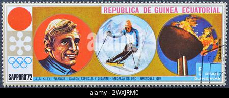 Gestempelte Briefmarke von Äquatorialguinea, die Jean-Claude Killy, Riesenslalom, um 1972 zeigt. Stockfoto