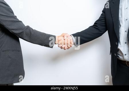 Die Geschäftsleute schütteln die Hände Stockfoto