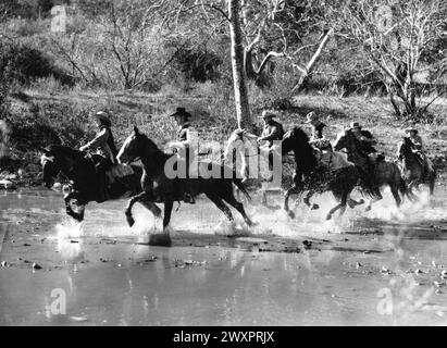 Brian Aherne, Victor McLaglen, John Carradine, John Warburton, am Set des Films „Captain Fury“, United Artists, 1939 Stockfoto