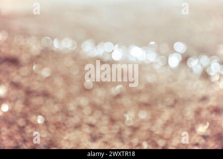 Beigefarbenes Fleck Strand Hintergrundfoto Stockfoto