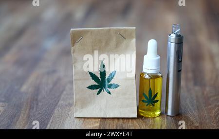 Papierbeutel aus biologischem Anbau mit Marihuana-Verdampfer cbd-Öl Stockfoto