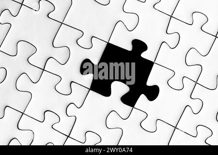 Jig Säge Puzzle mit einem fehlenden Stück Stockfoto