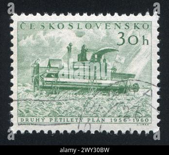 TSCHECHOSLOWAKEI - UM 1955: Stempel gedruckt von der Tschechoslowakei, zeigt Harvester, um 1955 Stockfoto