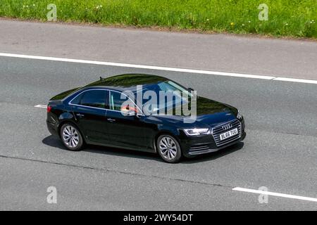 2016 Schwarzer Audi A4 SE Ultra TDI S-A 4-Der Limousine auf der Autobahn M6, Großbritannien Stockfoto