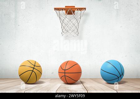 3D-Wiedergabe von drei Basketbälle, gelb, orange und blau, auf Holzboden unter einem Korb, der an einer grungy weißen Wand befestigt ist. Stockfoto