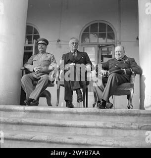 Winston Churchill, Franklin Roosevelt und Joseph Stalin treffen sich auf der Teheran-Konferenz im Nahen Osten am 3. Dezember 1943, um die Strategie der Alliierten zu erörtern. Stockfoto