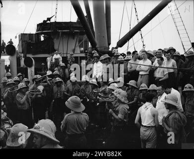 DAKAR BETRIEB. SEPTEMBER 1940 AN BORD DER SS PENNLAND WÄHREND DER FAHRT. - Die Band der Fremdenlegion übt während der Reise, während Mitglieder der Crew zuschauen. , Stockfoto