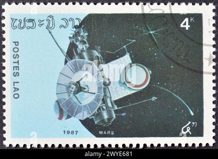 Gestempelte Briefmarke von Laos, auf der Raumsonde 'Mars' um 1987 abgebildet ist. Stockfoto