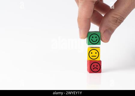 Kundenzufriedenheitsumfrage, Feedback oder positives Leben mit Smiley Face Stockfoto