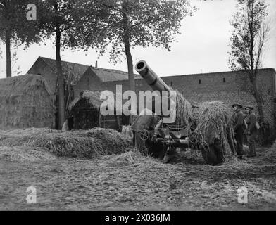 DIE BRITISH EXPEDITIONARY FORCE (BEF) IN FRANKREICH 1939-1940 – der 'Phoney'-Krieg, Oktober 1939 – Mai 1940: 8-Zoll-Haubitze des 1. Schweren Regiments, Royal Artillery getarnt in Position nahe Laquielle British Army, Royal Artillery Stockfoto