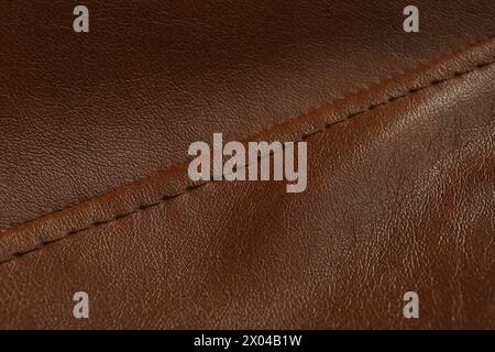 Braunes Leder mit Naht als Hintergrund, Nahaufnahme Stockfoto