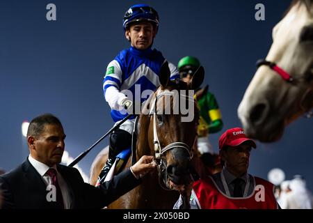 Senor Buscador und Junior Alvarado starten die Gruppe 1 Emirates Dubai World Cup 2024, 24.03.30. Kredit-JTW-Equine-Bilder. Stockfoto