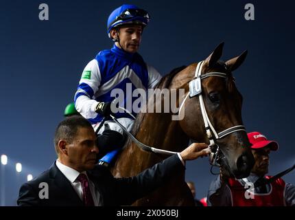 Senor Buscador und Junior Alvarado starten die Gruppe 1 Emirates Dubai World Cup 2024, 24.03.30. Kredit-JTW-Equine-Bilder. Stockfoto