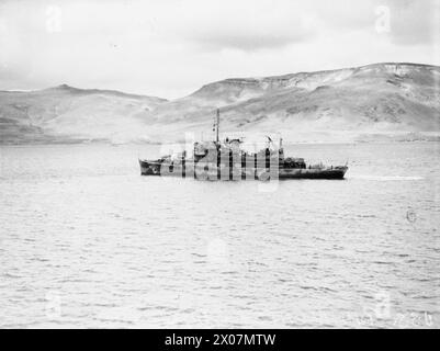 BRITISCHE UND US-AMERIKANISCHE FLUGZEUGE UND KRIEGSSCHIFFE DECKEN DEN RUSSISCHEN KONVOI AB. 29. MAI BIS 3. JUNI 1942 AN BORD DER HMS SIEGREICH AUF SEE UND IN HVALFJORD, ISLAND. - Der US-Wasserflugzeugtender USS BARNEGAT USS Barnegat Stockfoto