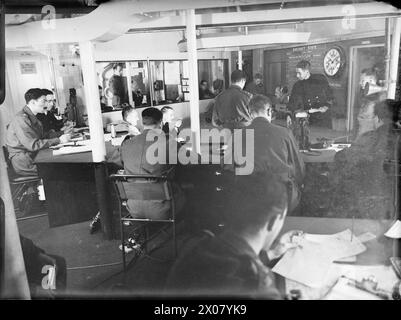 Während der Operation Husky am 9-10. Juli 1943 wird die HMS Hilary am ersten Tag der Invasion vor Sizilien im Operationssaal abgebildet. Stockfoto