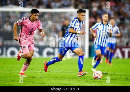 Guadalupe, Mexiko. April 2024. GUADALUPE, MEXIKO - 10. APRIL: der 11. Mittelfeldspieler Rayados, Maxi Meza, der am 10. April 2024 im BBVA Stadium in Guadalupe, Mexiko im Viertelfinale Leg 2 of 2 des CONCACAF Champions Cup vom 20. Mittelfeldspieler Inter Miami, Diego Gómez, jagte nach vorne. (Foto: Toby Tande/PxImages) Credit: PX Images/Alamy Live News Stockfoto