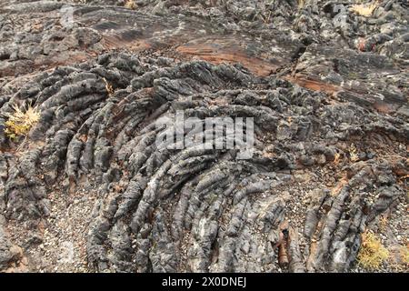 Lavafarbe entlang des North Crater Flow Trail im Craters of the Moon National Monument and Preserve, Idaho Stockfoto