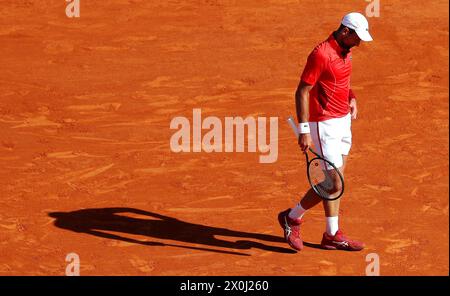 Roquebrune Cap Martin, Frankreich. April 2024. ; Rolex Monte-Carlo Masters - Quart de Finale - Novak Djokovic (SRB en rouge) vs Alex de Minaur (aus en bleu) *** Lokaler Titel *** Credit: MAXPPP/Alamy Live News Stockfoto