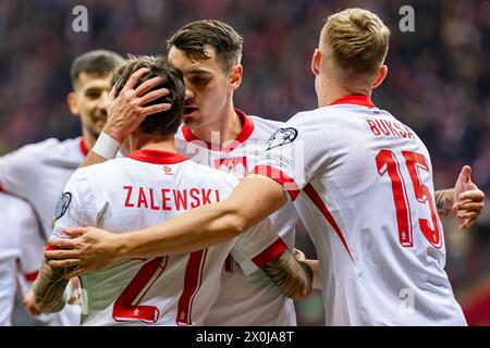 WARSCHAU, POLEN - 21. MÄRZ 2024: Qualifikationsspiel zur UEFA Euro 2024: Polen - Estland 5:1 o.p: Nicola Zalewski, Jakub Kiwior, Adam Buksa Stockfoto