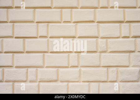 Hintergrund von einer gemalten alten Ziegelmauer Stockfoto