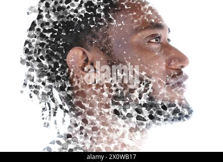 Ein künstlerisches Bildporträt eines Mannes mit Dreadlocks Stockfoto