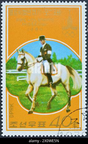 Abgesagte Briefmarke gedruckt von Nordkorea, die die Vorolympiade Moskau 1980 - Reiten zeigt, um 1978. Stockfoto