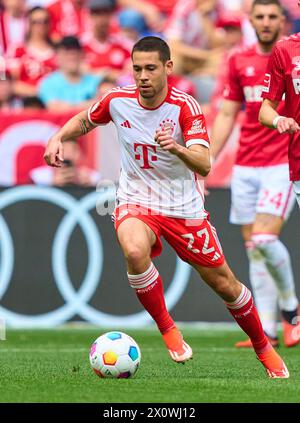 Raphael Guerreiro, FCB 22 im Spiel FC BAYERN MÜNCHEN - 1.FC Köln 2-0 am 13. April 2024 in München. Saison 2023/2024, 1.Bundesliga, FCB, München, Spieltag 29, 29.Spieltag-Fotograf: ddp-Bilder / STAR-Bilder - DFL-VORSCHRIFTEN VERBIETEN JEDE VERWENDUNG VON FOTOGRAFIEN als BILDSEQUENZEN und/oder QUASI-VIDEO - Stockfoto