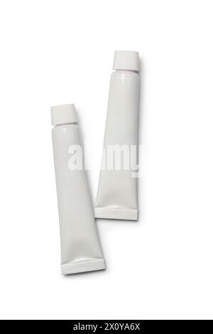 Zwei Röhrchen Modell-Vorlage für Farbe Zahnpasta Kleber Creme Gel oder Shampoo, leere Verpackung isoliert weißen Hintergrund, Kunstbedarf Medizin oder Kosmetik Stockfoto