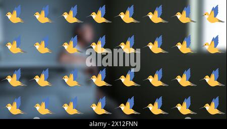Bild von Vogelsymbolen über birassischer Frau im Bett Stockfoto