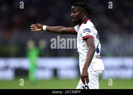 Mailand, Italien. April 2024. Antoine Makoumbou von Cagliari Calcio gibt während des Fußballspiels der Serie A zwischen dem FC Internazionale und Cagliari Calcio im Stadio Giuseppe Meazza am 14. April 2024 in Mailand. Quelle: Marco Canoniero/Alamy Live News Stockfoto