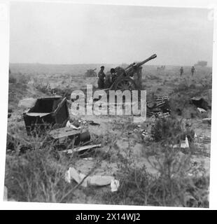 EL HAMMA NACH GABES. 8. ARMEE MARSCHIERT DURCH EL HAMMA NACH GABES, Einer eroberten deutschen Geschützposition der Britischen Armee Stockfoto