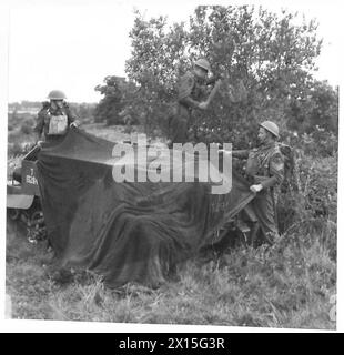 NEUES RECCE CORPS IN AKTION - Tarnung des Bren-Trägers, britische Armee Stockfoto